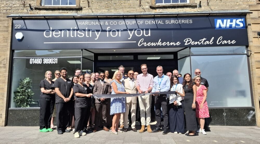 Guests gather for the ribbon cutting at the opening of Crewkerne Dental Care