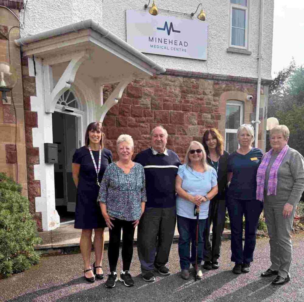 Staff standing outside Minehead Medical Practice