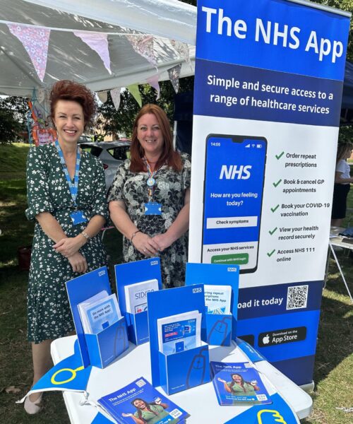 Picture of NHS Somerset Digital Team at an outside event with information on the NHS App